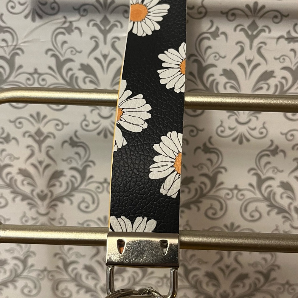 Homemade faux leather daisy wristlet
